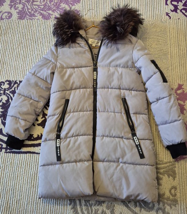 Женский пуховик продам