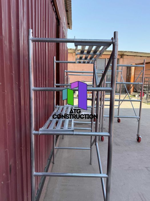 Строительные леса складные оцинкованные комплект с настилом и колесами