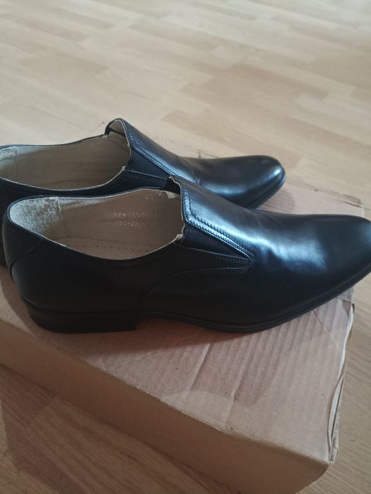 Продам новые кожаные туфли