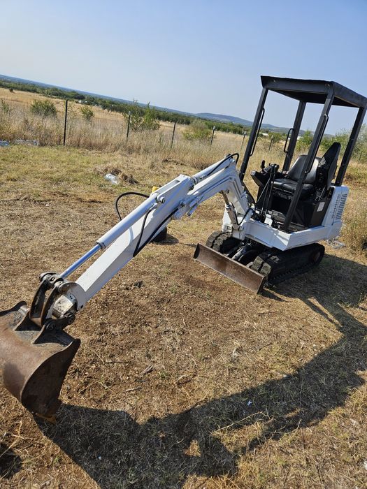 Бобкат 220 мини багер