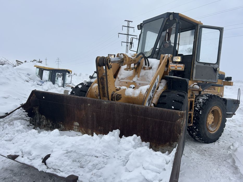 Погрузчик двух кубовый китай