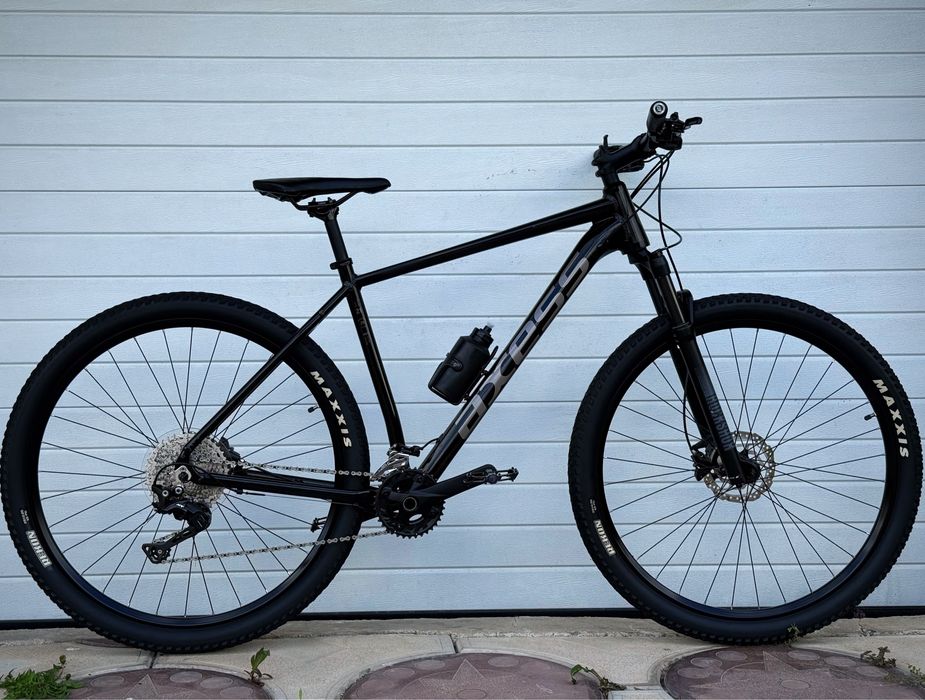 Vand Bicicleta AXESS,full DEORE XT,furca ROCK SHOX pe aer, aproape noua!