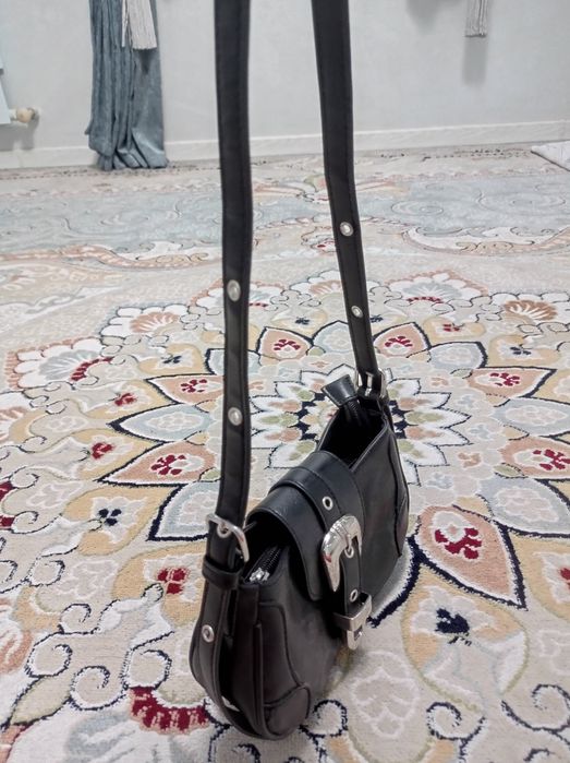 Стильная чёрная сумка — тренд сезона