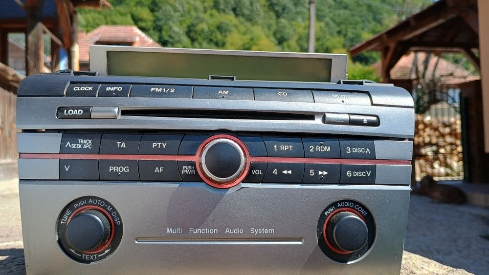 Radio CD Mazda 3, anii  2003-2007