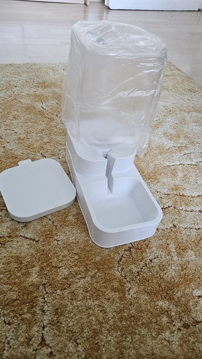 Автоматична поилка за котки. Диспенсър за вода.