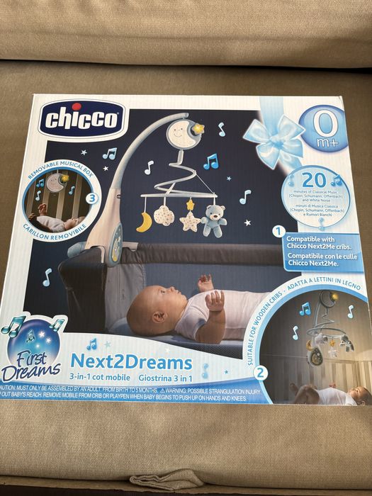 Нова Музикална въртележка за легло next to me Chicco