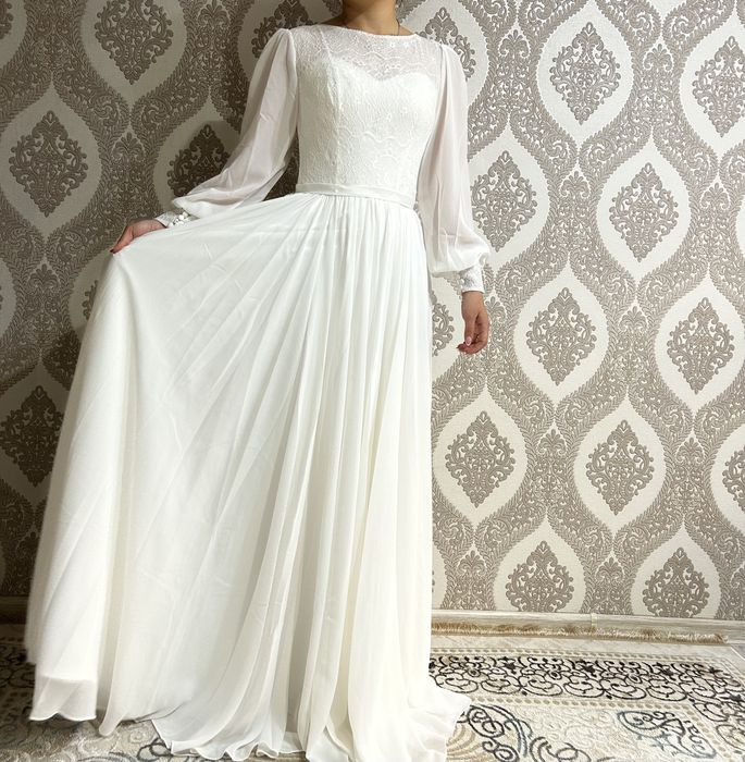 Продам свадебное платье 44р