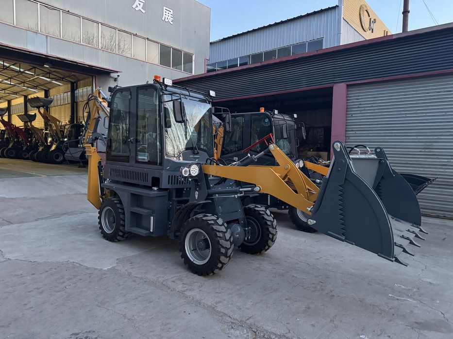 Экскаватор погрузчик 2026