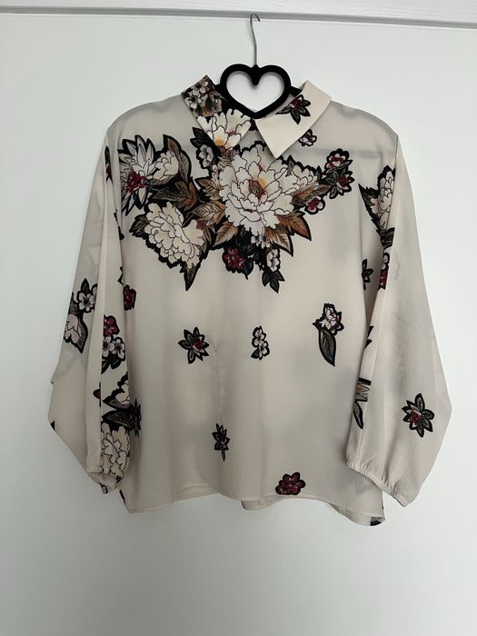 Bluza eleganta ivoar cu imprimeu floral