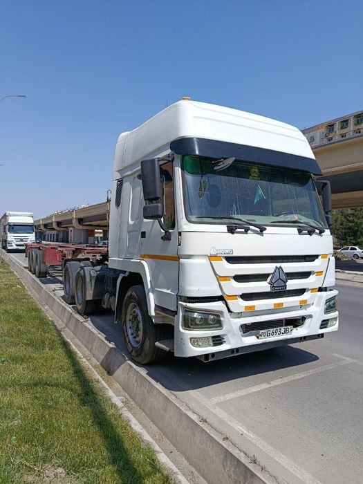 HOWO A6 + Контейнеровоз прицеп Сотилади