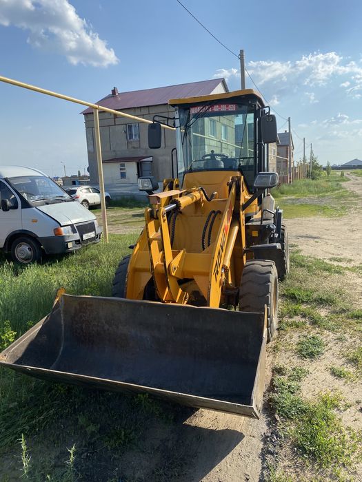 Услуги фронтального погрузчика