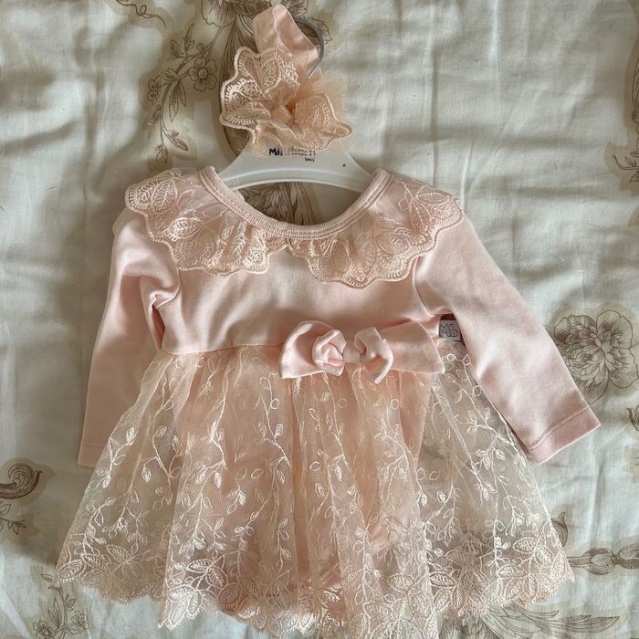 Дрехи за новородено