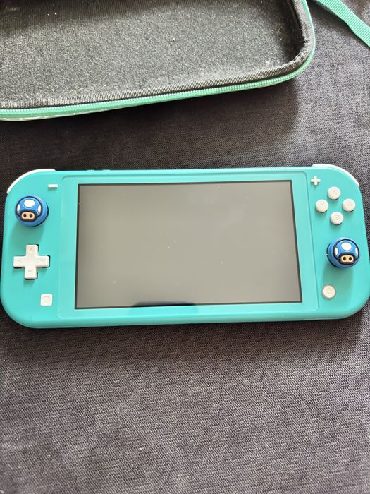 Nintendo Switch Lite (+Zelda BOTW/Hogwarts Legacy)