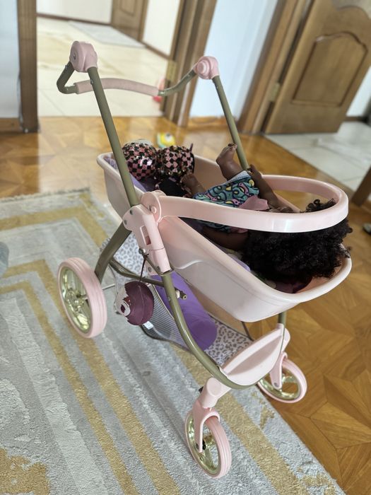 Коляска игрушечная.