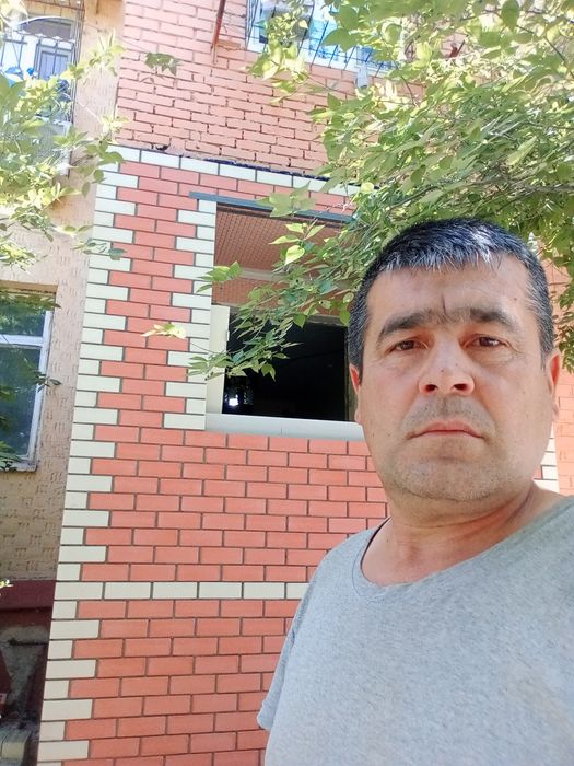 Кладка балкона. аблицовичньм и простим  кирпичом