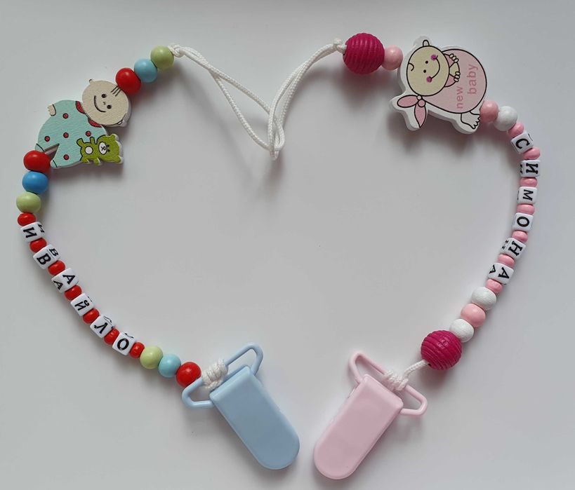 Клипс за биберон и чесалка