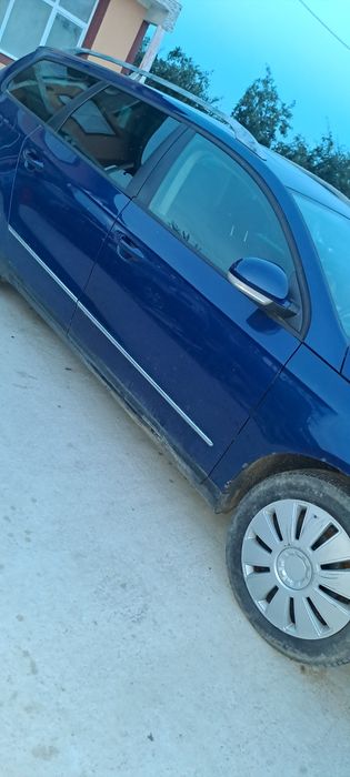 Vând usi dreapta fata dreapta spate vw passat b6 break LC5E fara rugina