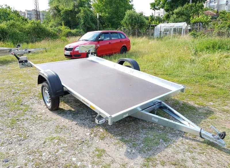 Ремарке,платформаремарке с повдигащ механизъм кат Б,750кг