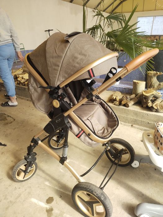 Продам коляску и ходунки