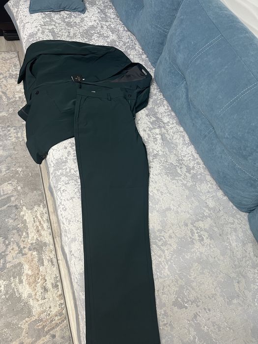 Костюм новый не носил