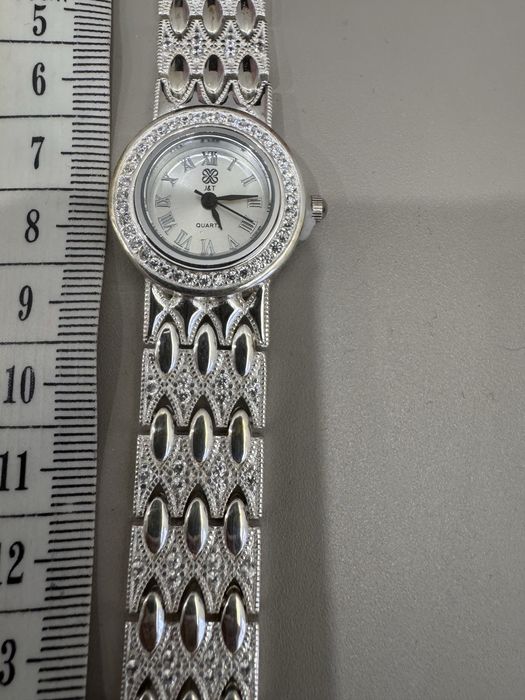 Часы покрытые серебром