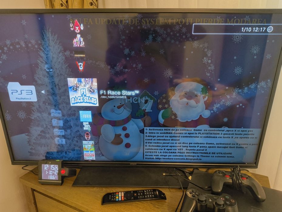 PlayStation 3 modat cu volan și pedale