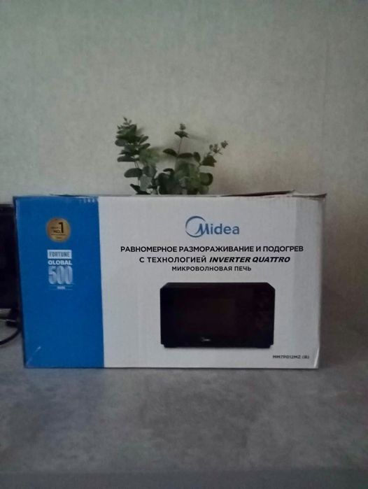 Продам новую микроволновку Midea
