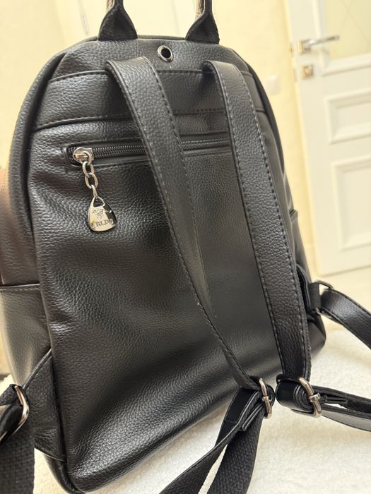 Новый кожаный рюкзак