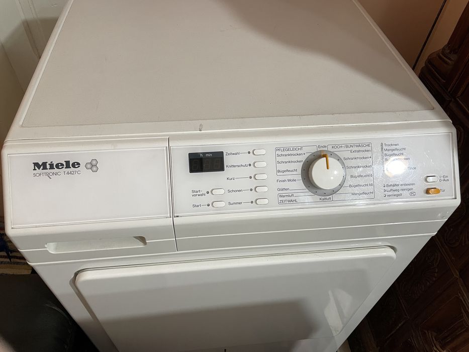 Vand masina de spalt si uscator de haine Miele aproape noi