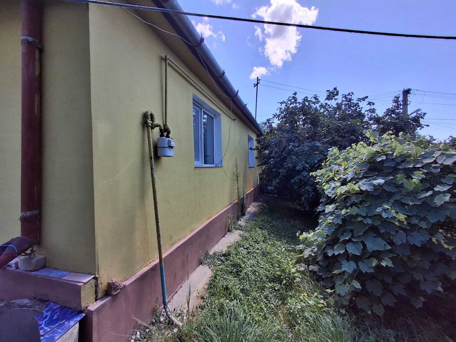 Casă de vânzare în centrul comunei Sânger, județul Mureș – 100 mp + teren intravilan 3.300 mp