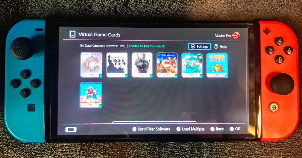 Nintendo Switch OLED Edition (пълен комплект) + допълнителна памет + калъф + акаунт със 7 топ игри