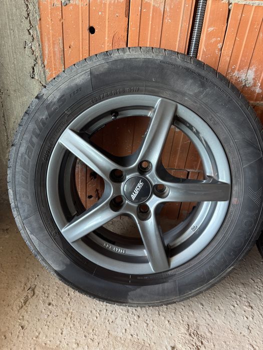 Set 4 jante aliaj Alutec 15" + anvelope vară Yokohama BluEarth 195/65 R15