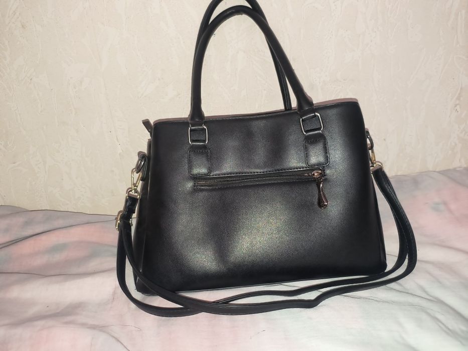 Sumka sotiladi rangi qora va chidamli