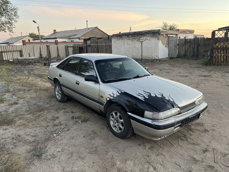 Mazda 626  на бодром ходу