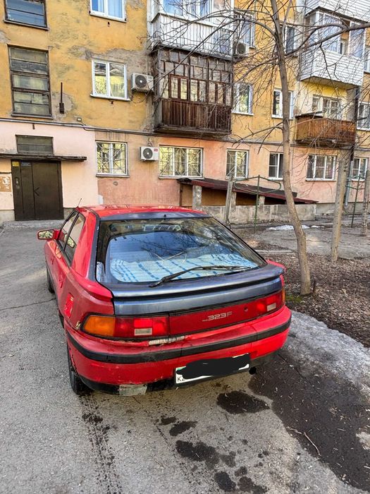 Мазда 323 с фарами-глазками