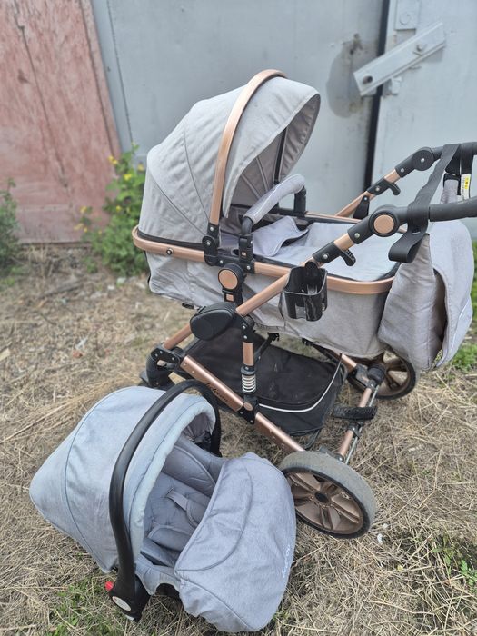 Коляска детская с автолюлькой