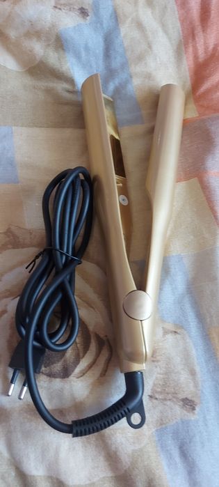 Преса за  къдрене на коса.