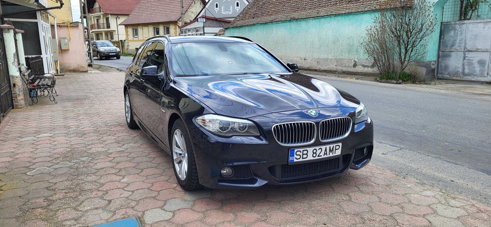 BMW Seria 5 2011 — imagine 2