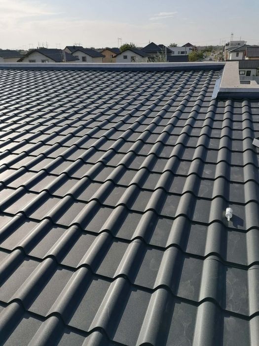 Montaj acoperis tigla metalica jgheaburi burlane reparații velux