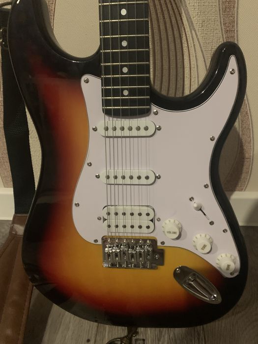 Электрогитара новая