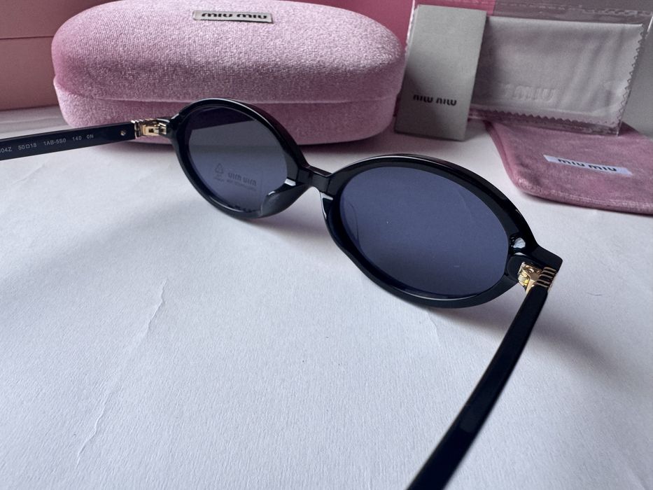 Ochelari de soare Miu Miu Oval SMU04Z 50-18 140, Noi