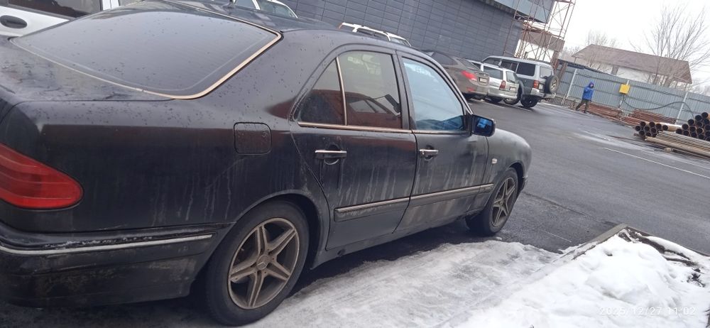 Мерседес 210 бенс