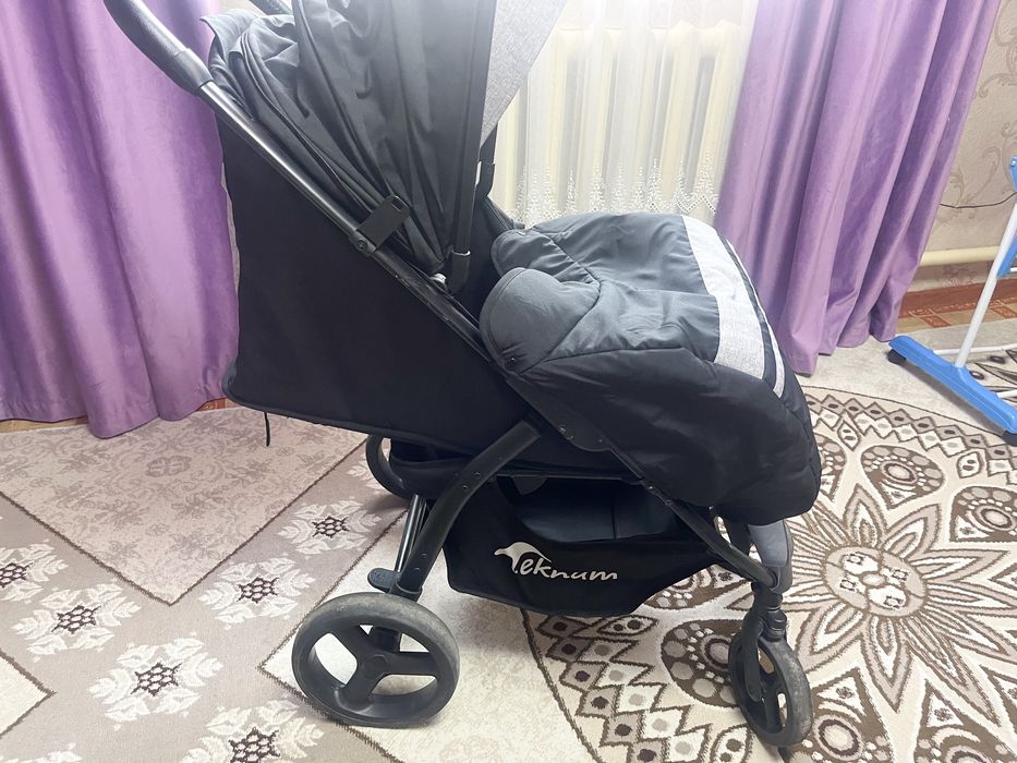 Детская прогулочная коляска