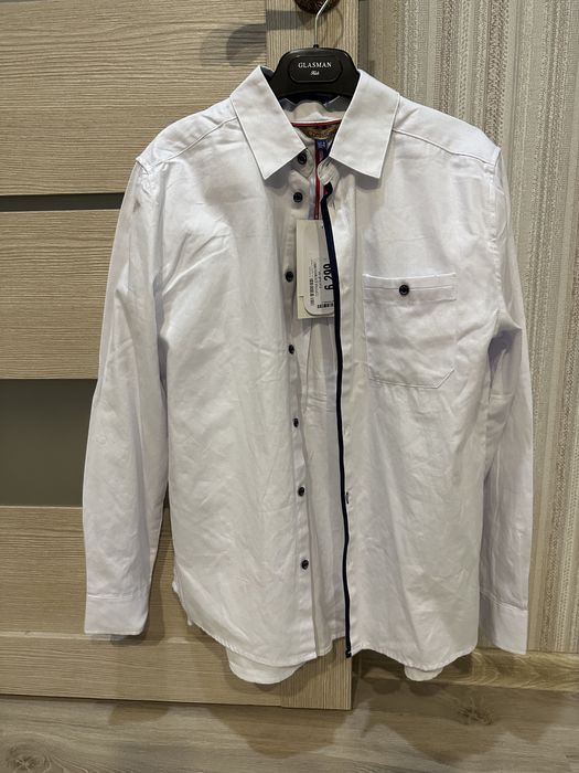 Продам новые школьные рубашки