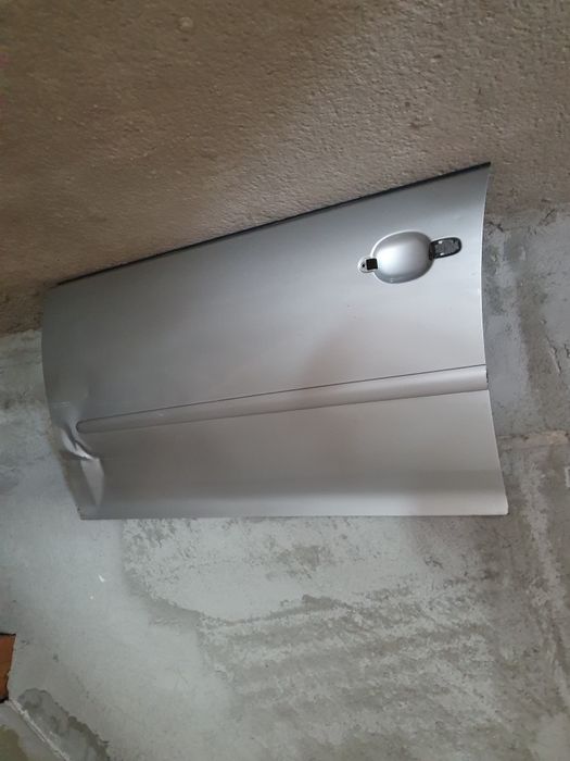 Fata de usa stanga fata VW Golf 5