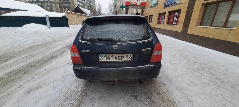 Мазда 323bj 1999 года