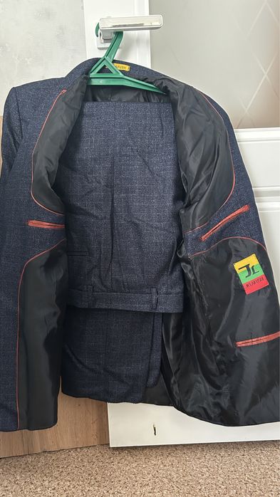 Костюмы новые