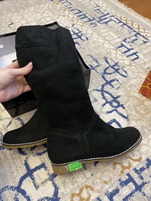 Продам новые сапоги