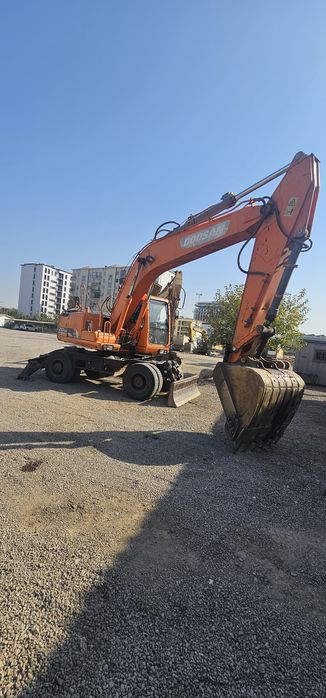 Доосан колёсный эксковатор 210 сотилади холати идеал 2014 йил апарат