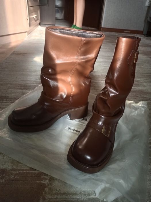 Продам сапоги новые